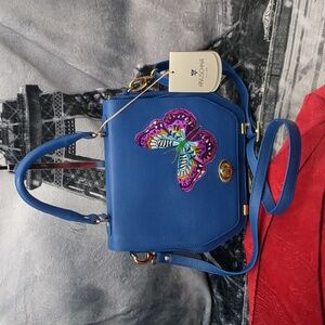 Anushka leather butterfly bag turn lock satchel